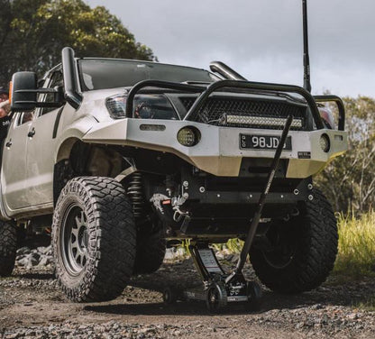 Titan Terrain rugged off-road floor jack lifting up lifted silver ute